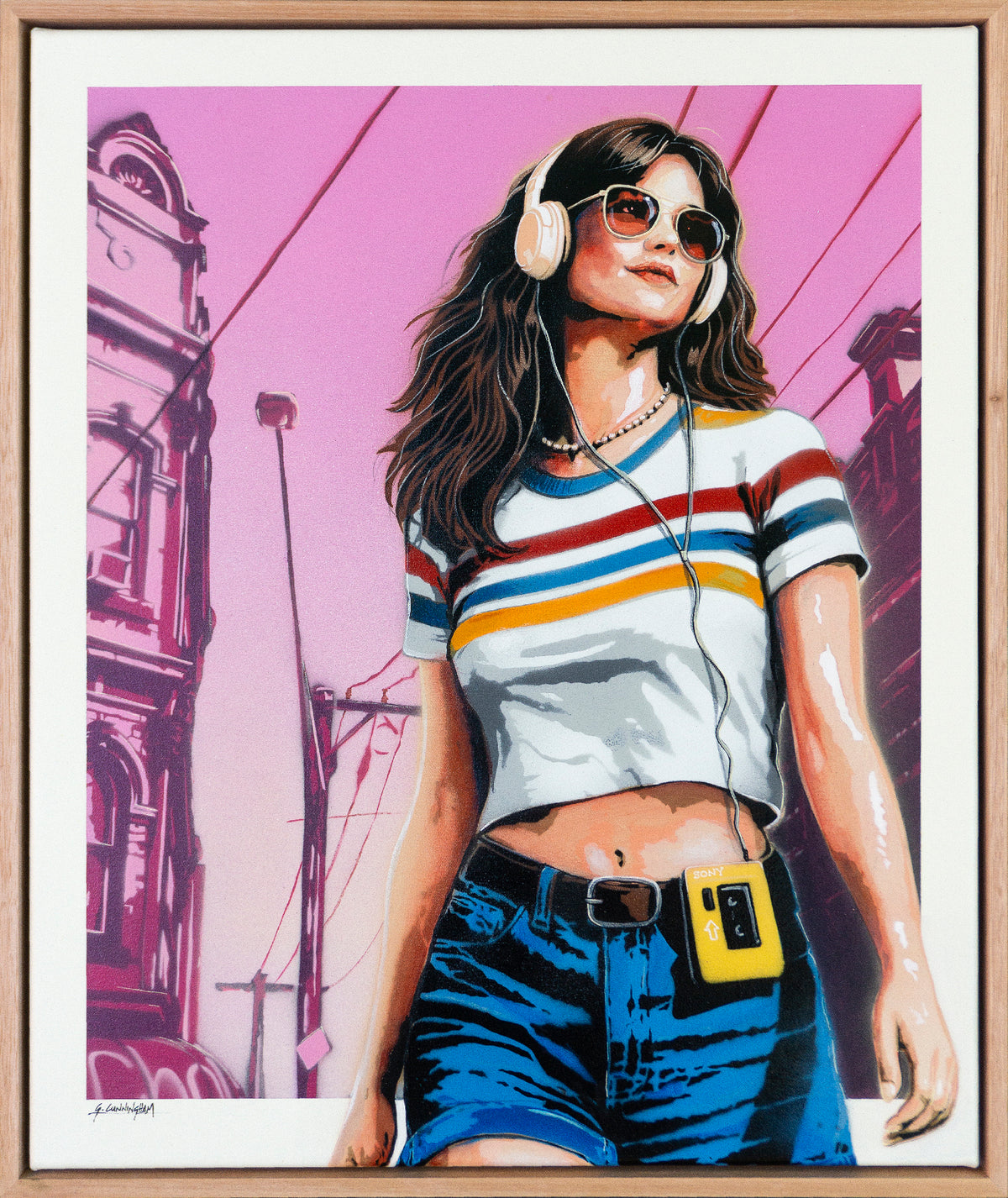 Electric Dream III by Geoff Cunningham – original Melbourne stencil artwork featuring a confident young woman wearing sunglasses and headphones, a yellow Sony Walkman, denim shorts and a striped T-shirt against a pink urban streetscape. Framed in natural timber.