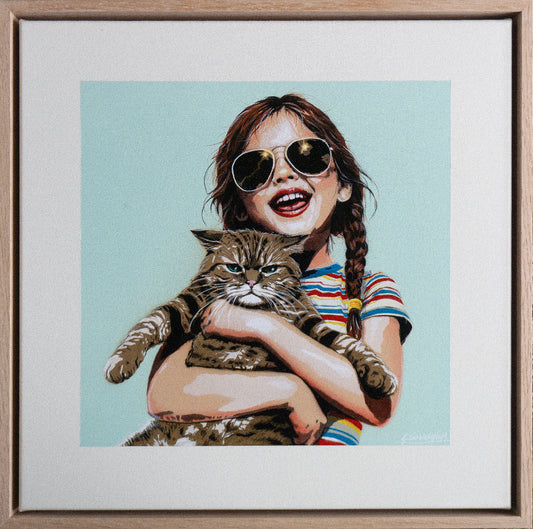 Sweet Surrender is an original artwork by Geoff Cunningham featuring a smiling girl holding a grumpy cat. A playful, nostalgic summer piece full of humour and character.