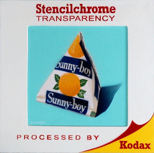 Sunny-boy orange carton on a blue background with 'Stencilchrome Transparency' and 'Kodak' branding.