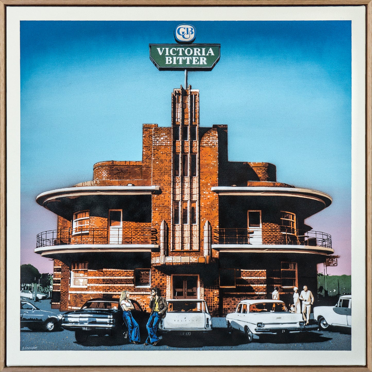 Art Deco-style building with 'Victoria Bitter' sign, vintage cars, and people in front.
